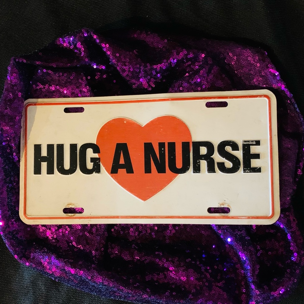 Vintage Hug a Nurse License Plate